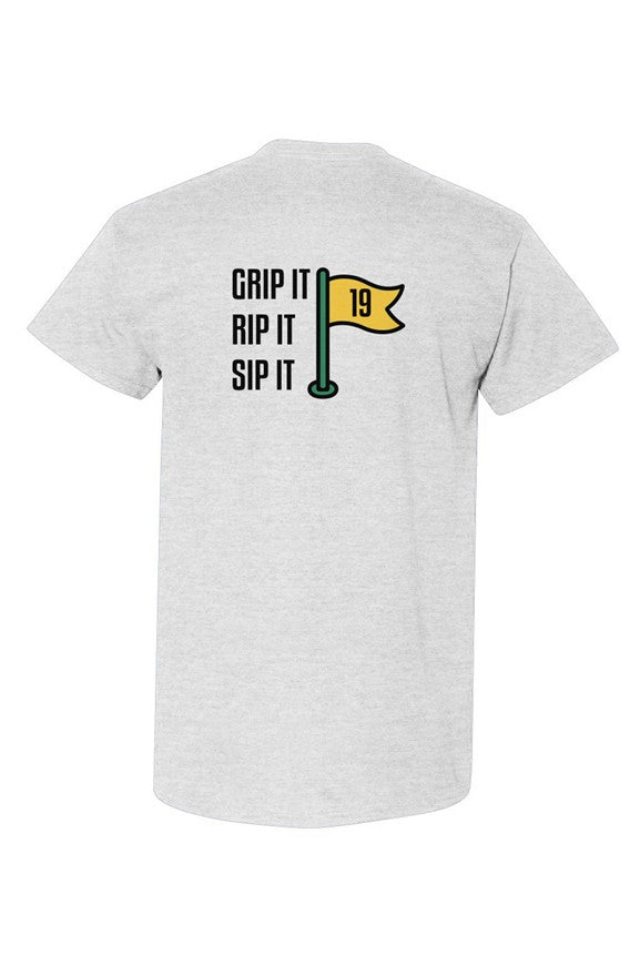 Sand colored Grip Rip Sip Tee with Ain’t Done Yet golf logo on chest and Grip It Rip It Sip It flag graphic on back
