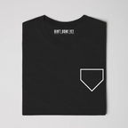 Middle Middle Tee with home plate graphic on front and baseball seam design with Ain’t Done Yet branding on back
