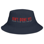 The Freedom Bucket hat in navy featuring embroidered Ain't Done Yet logo and Gear For The Grind tagline in patriotic colors.