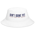 The Freedom Bucket hat in white featuring embroidered Ain't Done Yet logo and Gear For The Grind tagline in patriotic colors.