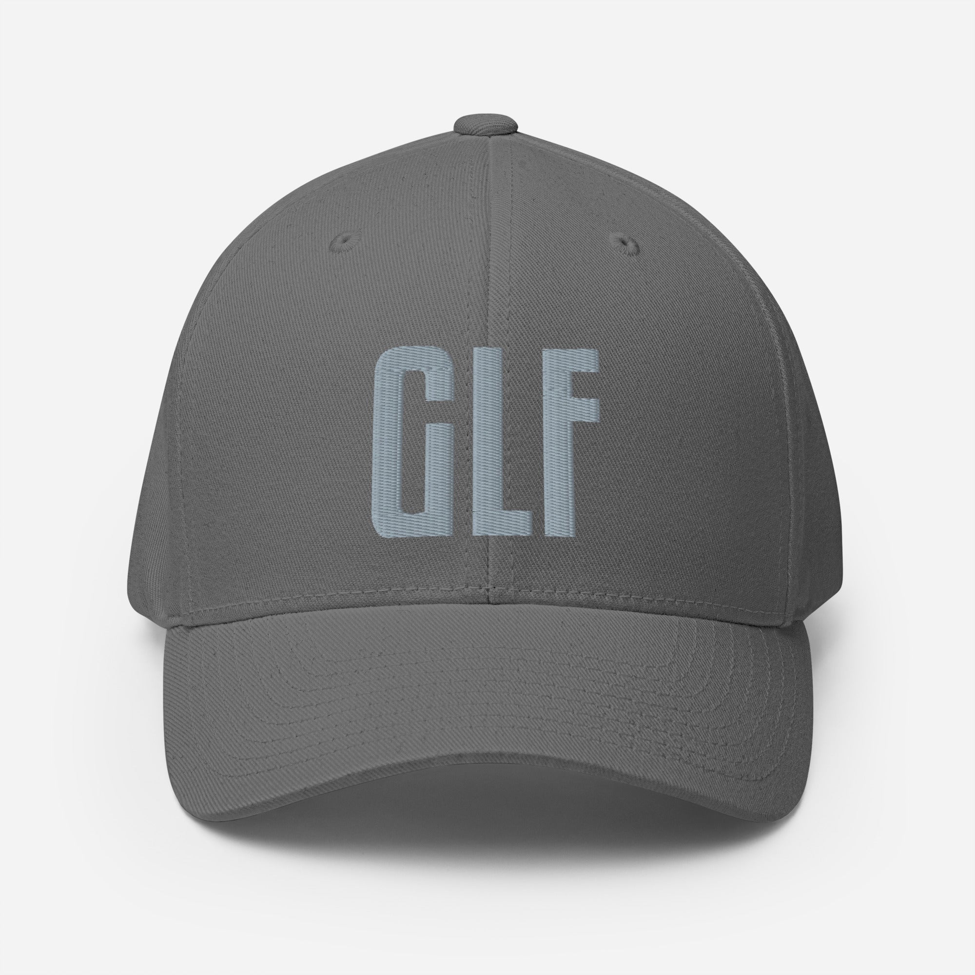 Flex-fit golf hat featuring Play Code GLF front embroidery with structured six-panel design and silver undervisor
