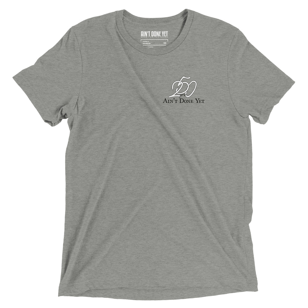 America 250 athletic grey t-shirt featuring distressed 250 graphic integrated with the Ain't Done Yet logo in a clean patriotic design.