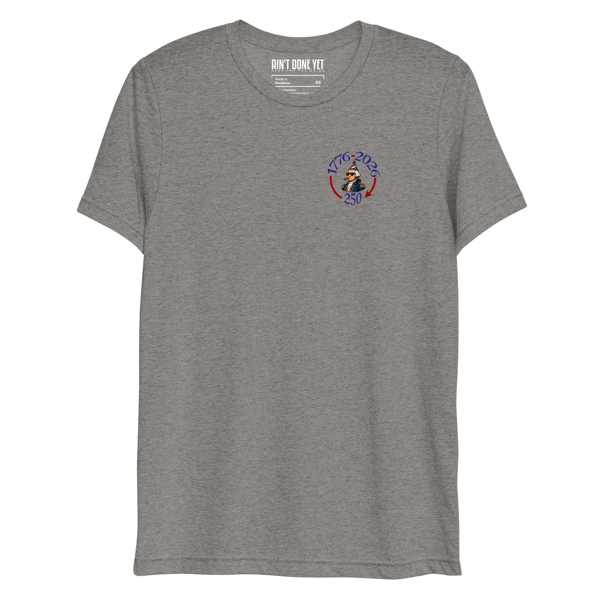 Still Partying America 250 grey t-shirt featuring George Washington wearing a birthday hat and sunglasses with a cigar, commemorating America's 250th anniversary.