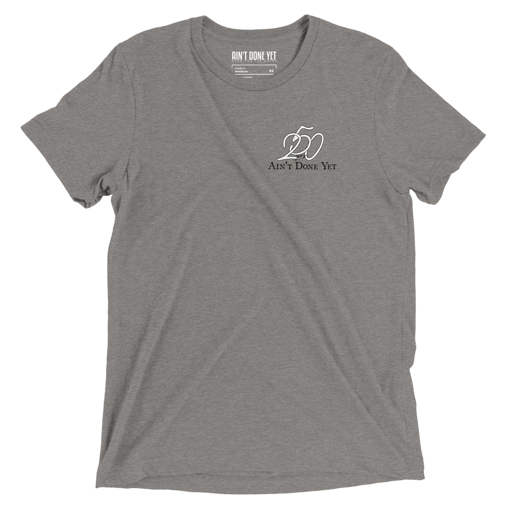America 250 grey t-shirt featuring distressed 250 graphic integrated with the Ain't Done Yet logo in a clean patriotic design.