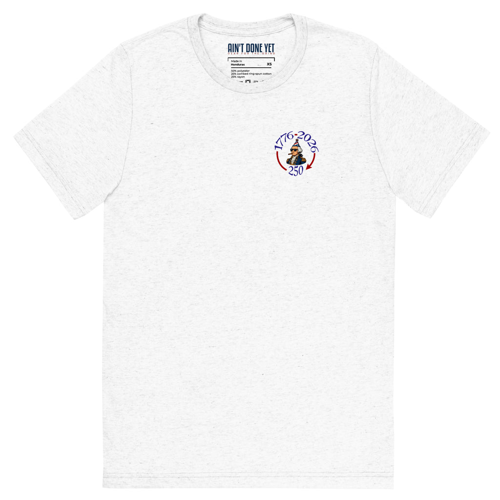 Still Partying America 250 white t-shirt featuring George Washington wearing a birthday hat and sunglasses with a cigar, commemorating America's 250th anniversary.