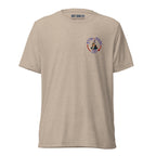 Still Partying America 250 tan t-shirt featuring George Washington wearing a birthday hat and sunglasses with a cigar, commemorating America's 250th anniversary.