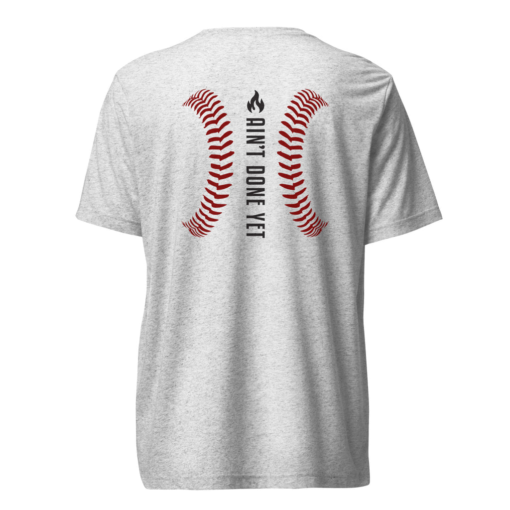 Ain’t Done Yet Middle Middle baseball tee featuring home plate graphic and baseball seam design on a lightweight tri-blend shirt.
